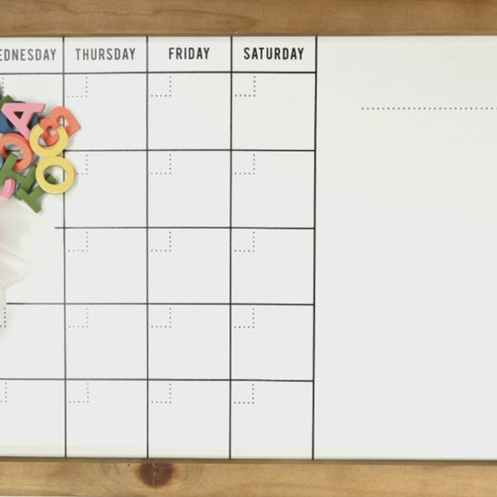 Dancing letter magnets across a white board